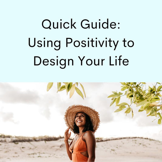 Woman in sunhat smiling looking at sky.